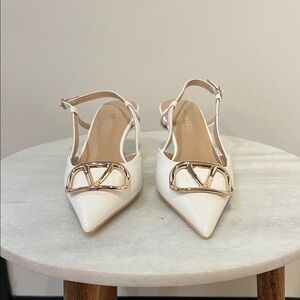 Chic White Slingback Heels with Gold Buckle